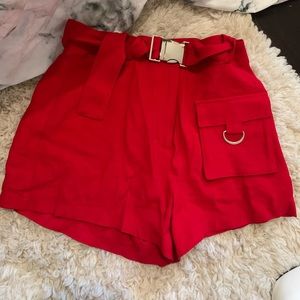 Revolve Red buckle shorts